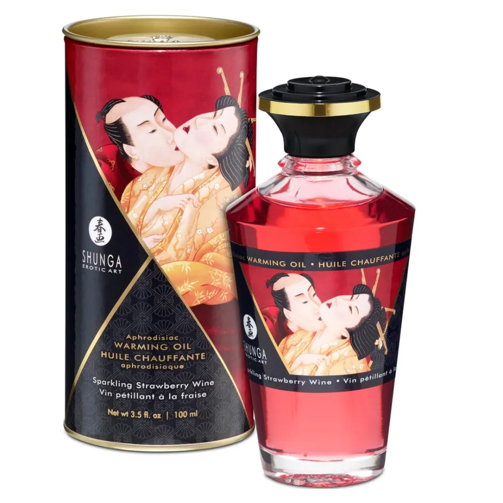 Hřejivý masážní olej Shunga s příchutí jahod a cavy, 100 ml