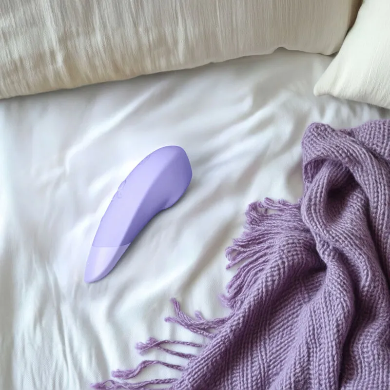Tlakový stimulátor klitorisu s vibracemi Womanizer Enhance, lila - obrázek 12