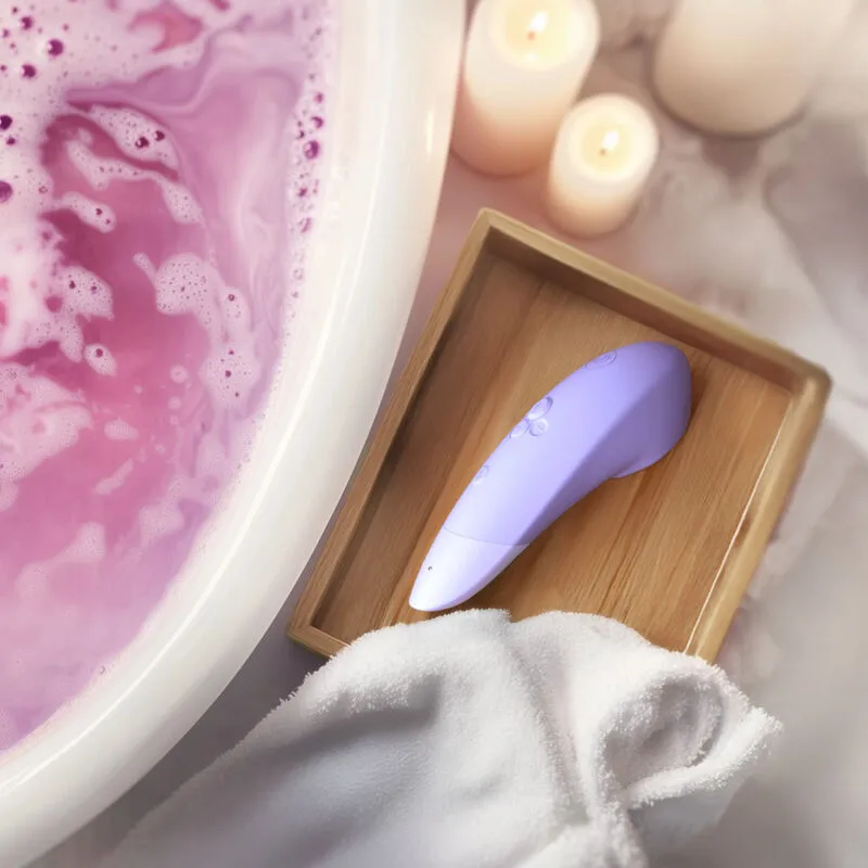 Tlakový stimulátor klitorisu s vibracemi Womanizer Enhance, lila - obrázek 13